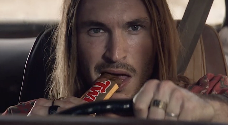 Twix Revs Up a Topsy-Turvy Retro Car Chase Image