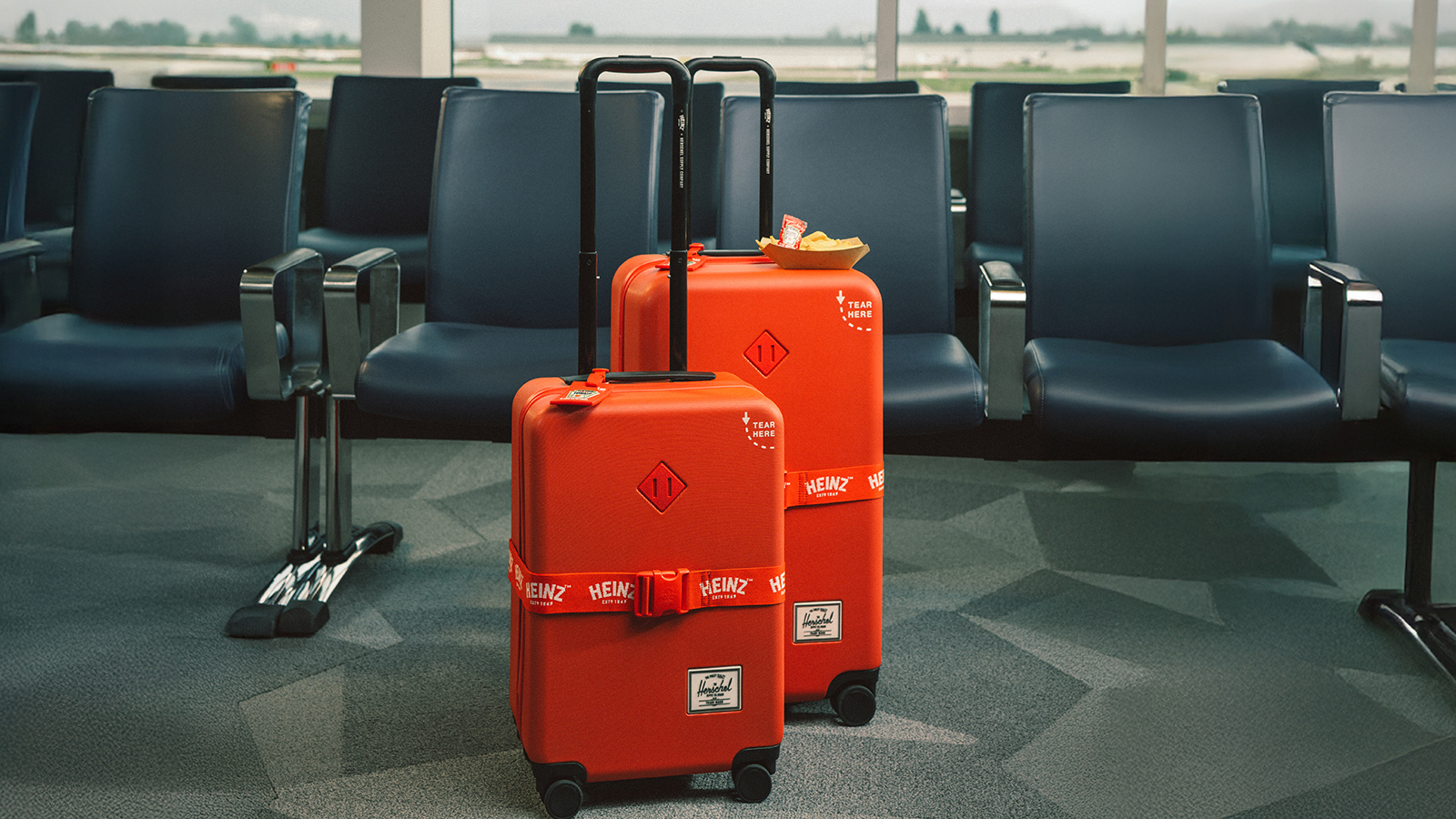 Heinz Collabs With Herschel Supply on Luggage That Resembles a Ketchup Packet Image