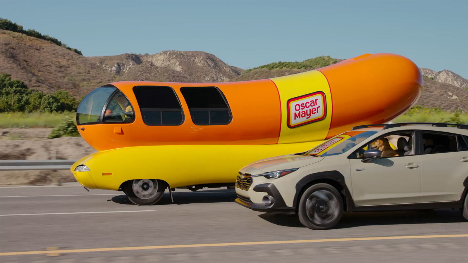 Hot Dog! Subaru’s Barkley Family of Pooches Chases the Oscar Mayer Wienermobile Image